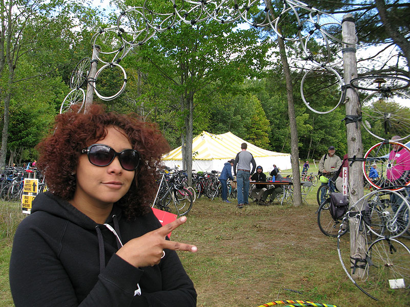 Unity College student Cynthia Jones in front of the bike station.