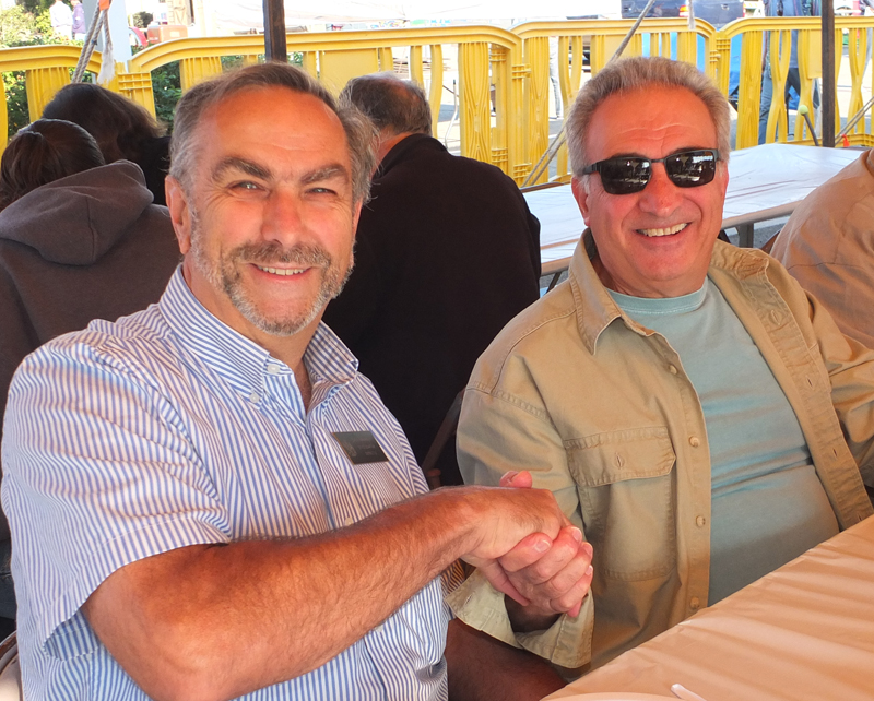 State Sen. Dave Miramant joins Ted Kanallakis for pancakes on the Camden Public Landing Saturday morning.