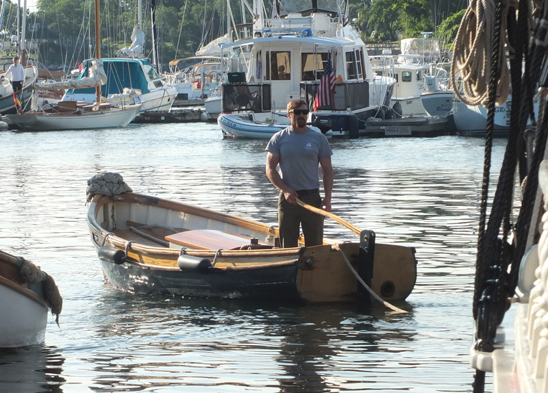 A yawl boat makes its way across Camden Harbor Saturday.