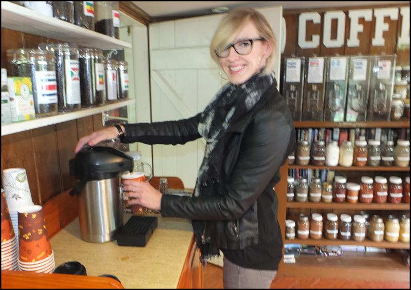 Carissa Dickey fills her cup at Foglifters. (Photos by Chris Wolf)