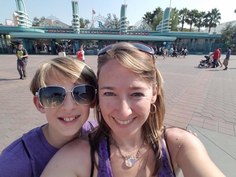 Wesley Henderson and his mom Gretchen Henderson in front of the gates to Disney's California Adventure. (Photo courtesy Gretchen Henderson)
