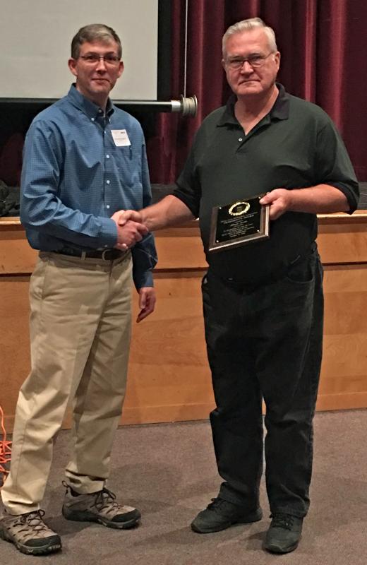 MSBA President Richard McLaughlin and EAS Master Beekeeper Rick Cooper, who was awarded an MSBA Lifetime Achievement Award Oct. 15 during the Association’s annual meeting in Rockland. (Photo by Matt Mank)