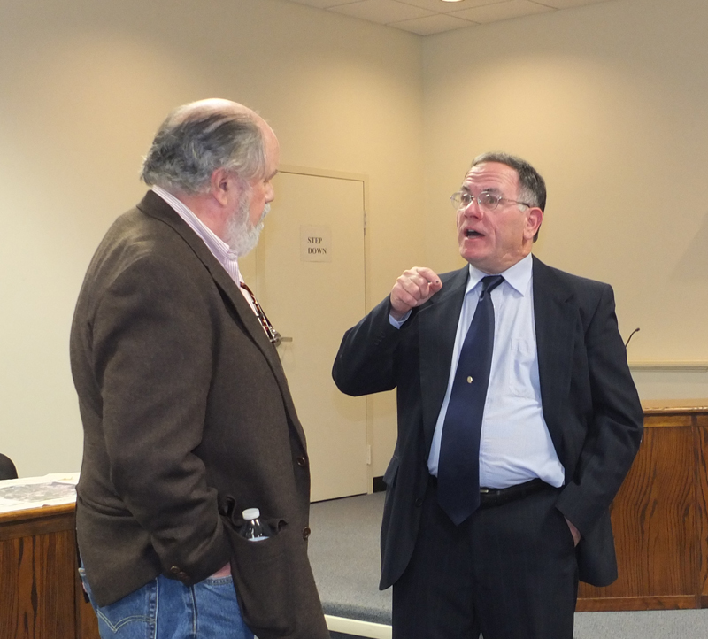 Former Rockland City Council member Richard Warner talks with Steve Betts before the forum begins
