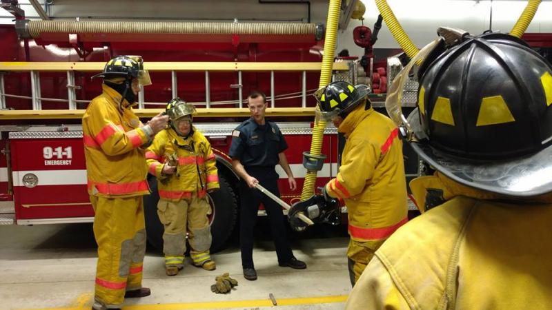 Matt Heath demonstrated how to use the Jaw of Life extrication equipment during the fist class of the public safety academy. (Photo by Sarah Shepherd)