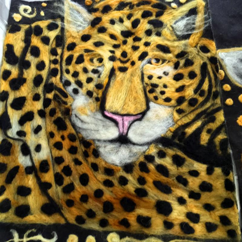 A leopard is one in a series of seven: The African Series. SUZI THAYER/Boothbay Register