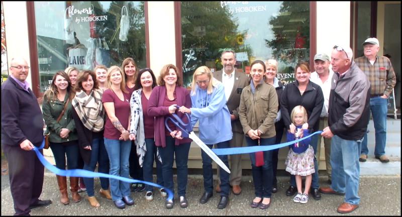 With a ribbon cutting, Flowers by Hoboken is open for business. (Photos by Chris Wolf)