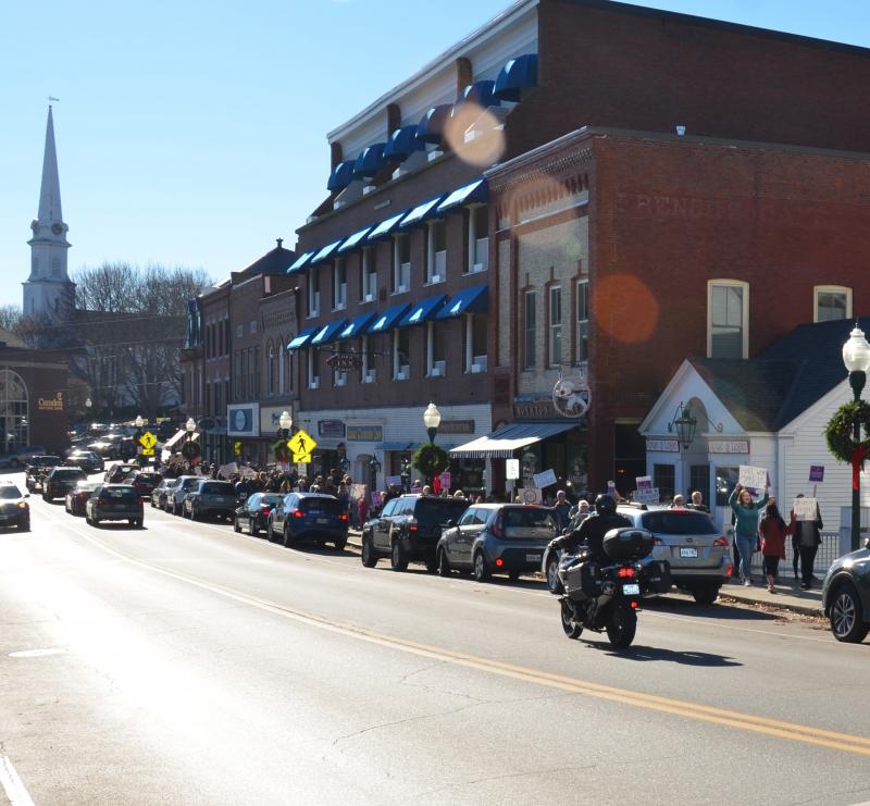 The march kept to the sidewalk on Route 1. (Photo by Lynda Clancy)
