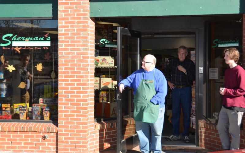 Shopkeepers came out to see what the commotion was about. (Photo by Lynda Clancy)
