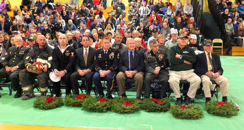 American Veterans receiving wreaths
