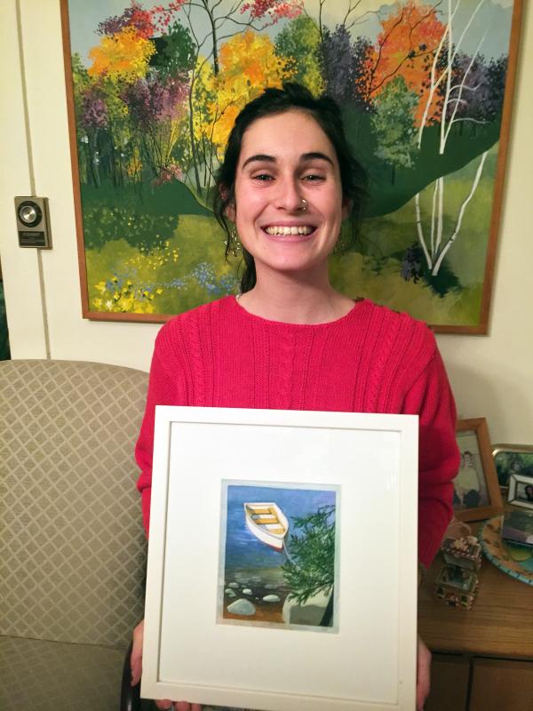 My niece, Sophia, holding one of my paintings, on Christmas day. She has a tiny waist. SUZI THAYER/Boothbay Register