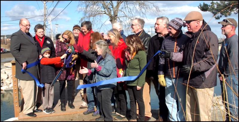 Trail committee members, politicians, dignitaries and supporters all helped cut the ribbon Sunday morning. (Photos by Chris Wolf)