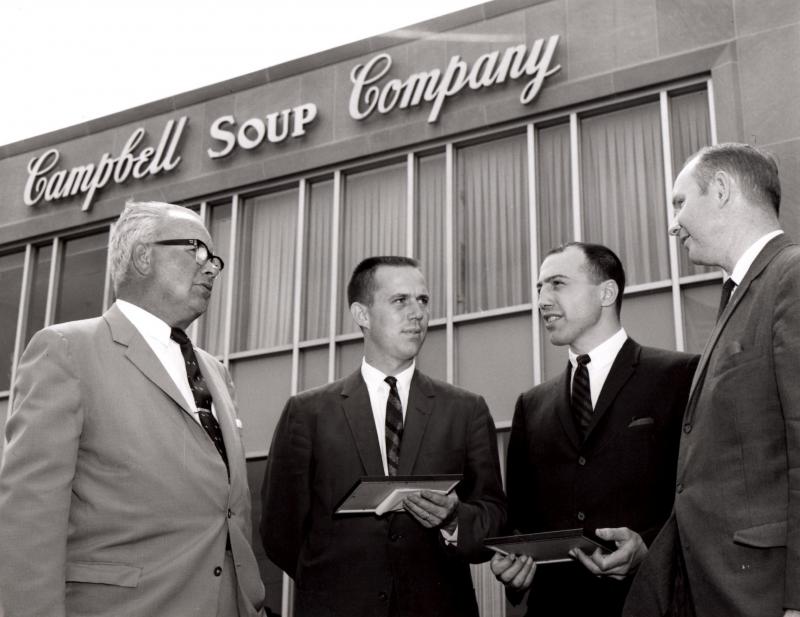 Pecorelli, second from right, talks with businessmen of the Campbell’s Soup Company. (Photo courtesy of Carmine Pecorelli)