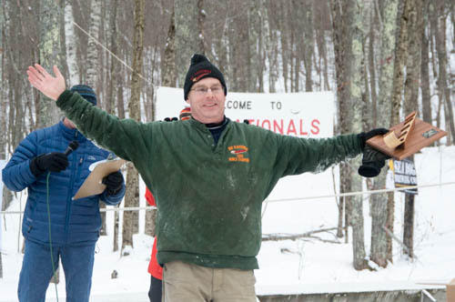 Bruce Richards, of Three Big Kahoonas, picks up his team’s trophy for 2nd place in the 3-Person division. (Photo by Marisa Hanning)