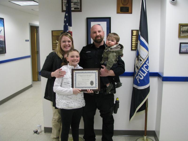 Officer Andrew Redden’s family joins him at the station for his award presentation. (Photo courtesy of Rockland Police Department)