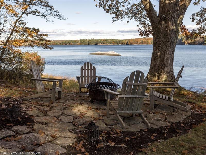 Architecturally inspiring home with an open floor plan giving unobstructed panoramic views of Great Salt Bay from every room. Beautiful hardscape and landscaping, dock. Three levels of finished living space. 245 Mills Rd, Newcastle 245 Mills Rd, Newcastle, Maine Newcastle Realty
