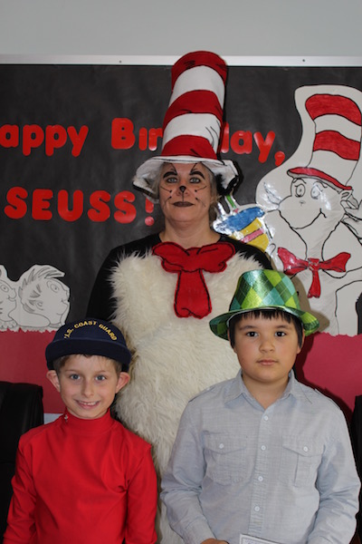 Bus Driver, Anita West, poses with Landon Purington and Donavan Bueno in her Cat in the Hat costume.