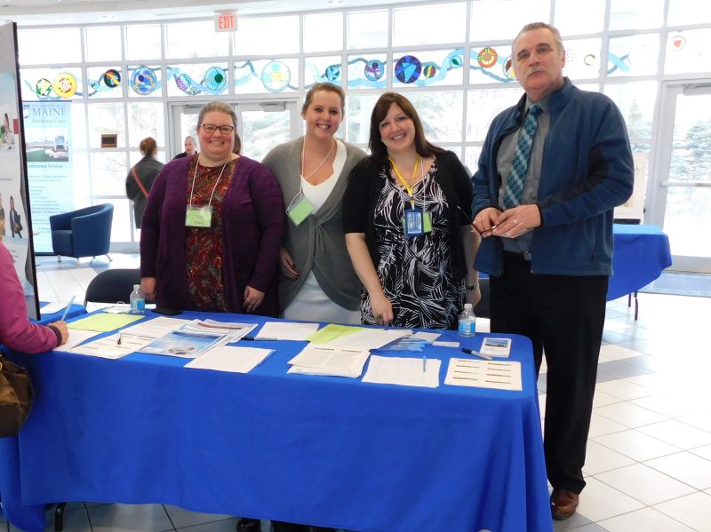 Manning the event entrance, from left to right: Kate Fagan, Tangie Ripley Khristina Landers and Richard Sterrs, all of Workforce Solutions (photo by Erica Thoms)