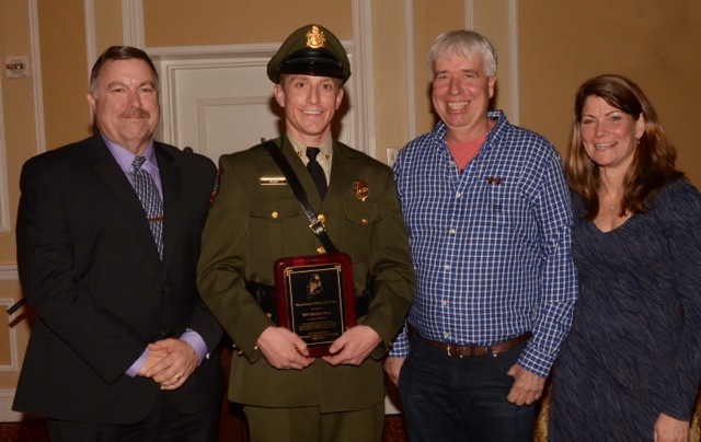 Maine Marine Patrol Officer Brendan Bezio (center) receives his officer of the year away March 4. With him are Marine Patrol Colonel Jon Cornish (left), MLA Board President David Cousens (2nd from right), and MLA Executive Director Patrice McCarron (right). (Photo Courtesy of Mark Haskell Photography)