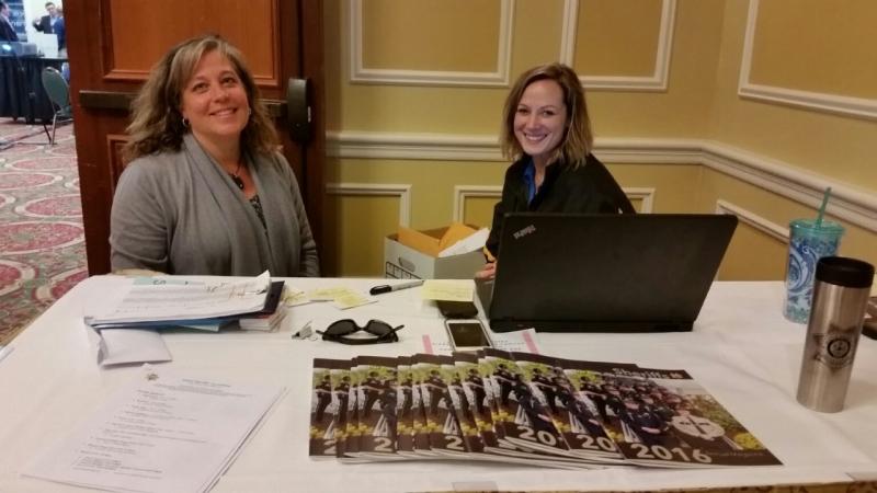 Heidi Carroll and Stephanie Polky of the Knox County Sheriff’s Office manage the registration desk at the conference. (Photo by Sarah Shepherd)
