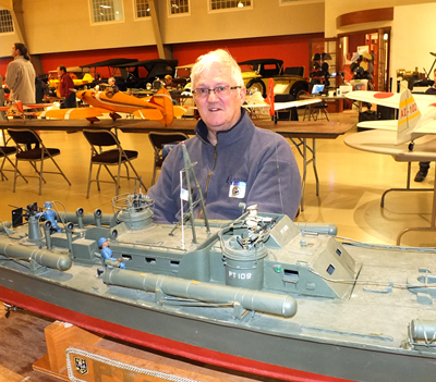 David Wellman of the Greater Portland R/C Boaters displaying his model of the famous PT 109.