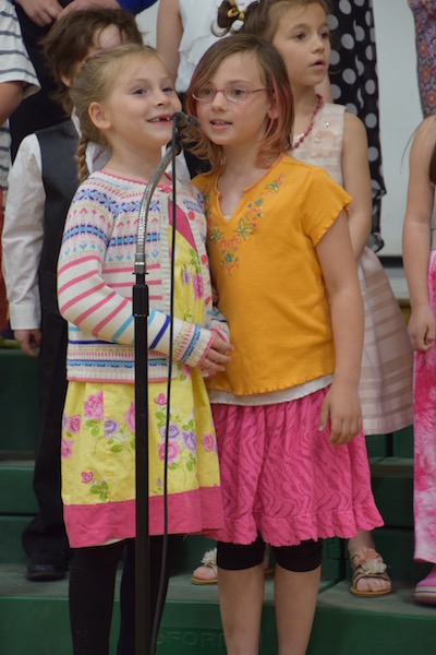 Iris Quint and Alexis Whipple sing a duet together.