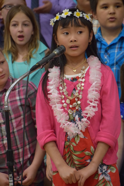 Samantha Bernardo sports tropical attire for her solo.