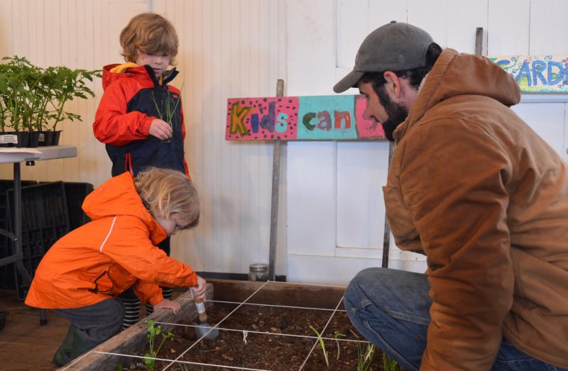 Digging in the dirt and planting crops. (Photo by Lynda Clancy)