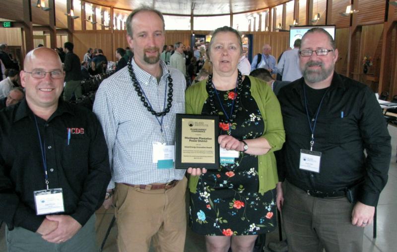 Marian Chioffi and Chris Smith of the Monhegan Plantation Power District (center) were joined by representatives of Innovative Construction & Design Solutions, LLC after receiving the Island Energy Innovation Award at the 2017 Island Energy Conference in South Portland on April 28. (Pictured L-R: Dan Fisher, ICDS; Chris Smith; Marian Chioffi; and Scott Fitch, ICDS)