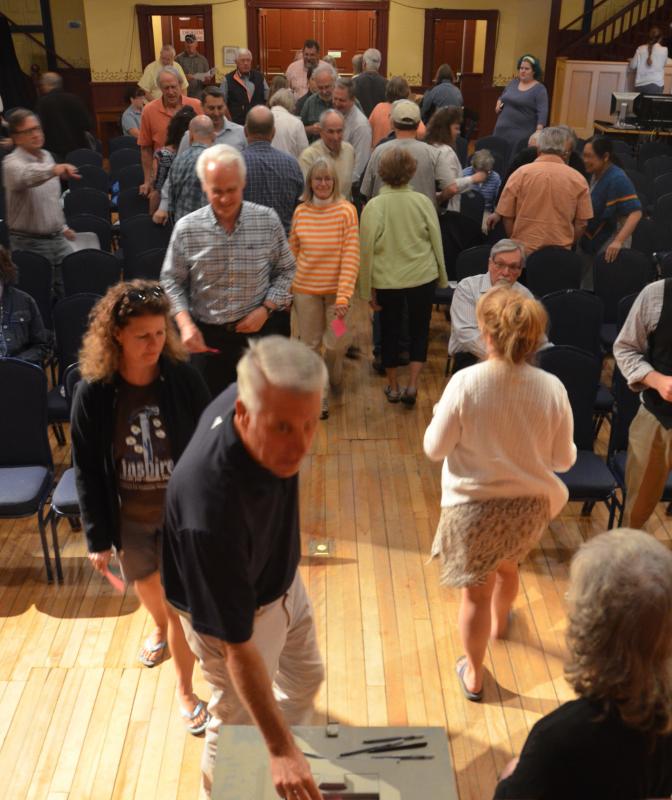 Voting whether or not to exceed state recommended spending, LD1 limits. (Photo by Lynda Clancy)