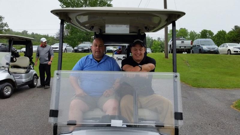 Sgt. Jim Moore and Patrol Officer Chris Taylor, Rockport Police Department, head out to the golf course at the start of the tournament. (Photo by Sarah Shepherd)
