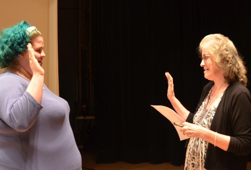 Rockport Town Clerk Linda Greenlaw (right) swears in Heaven Bartlett for the Budget Committee and Library Committee. Heaven is Linda’s granddaughter. (Photo by Lynda Clancy)