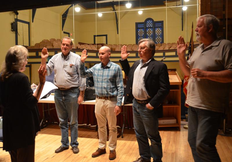 Rockport Town Clerk Linda Greenlaw swears in Doug Cole, Tom Gray, Tom Murphy and Mark Kelley (Photo by Lynda Clancy)