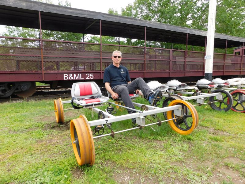 RailCyclers tour guide James Thomas, provided entertainment courtesy of his company, Maine Audio Visual. (photo by Erica Thoms)