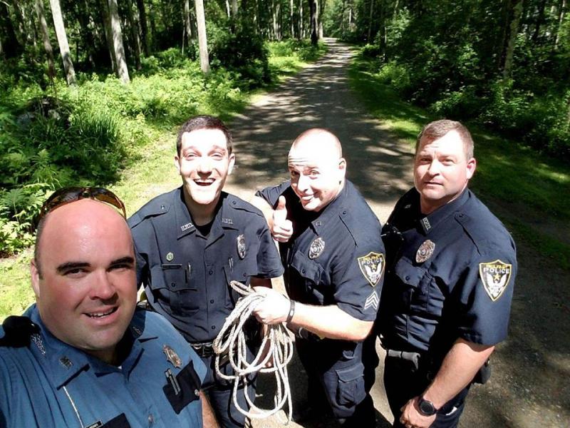 Left to right: Maine State Police Trooper Webber, Belfast Police Officer Kolko, Sergeant Fitzpatrick, and Officer Rick Smith.
(photo courtesy of the Belfast Police Department)