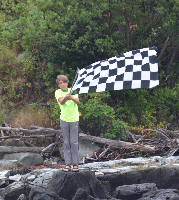 On Grindle Point, the the flagger waves the swimmers ashore. (Photo by Lynda Clancy)