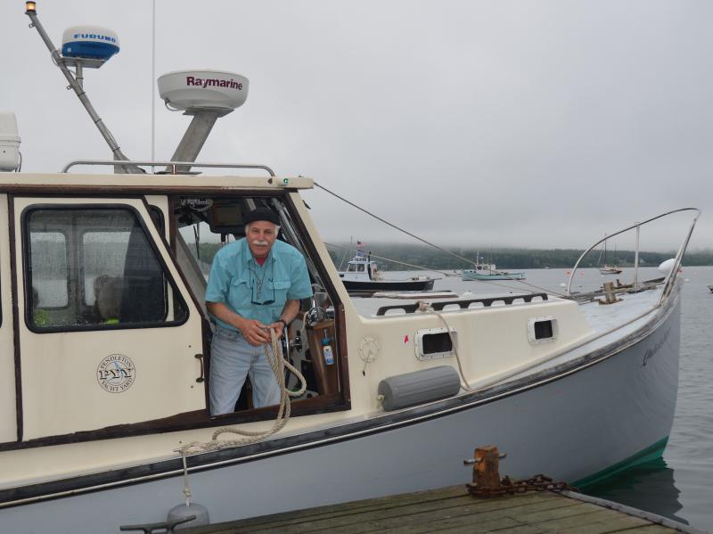 Capt. Keith Cafferata and the Quicksilver help ferry volunteers back and forth to Islesboro from Lincolnville Beach. (Photo by Lynda Clancy)