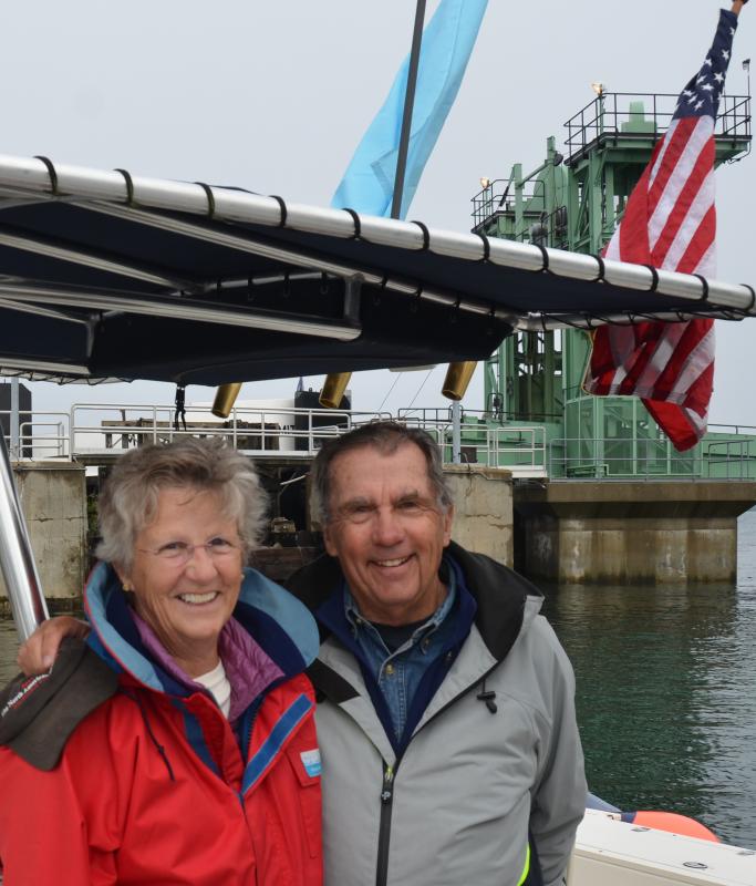 Dale and Doug Bruce, of Camden, donated their time and boat to transport media writers and photographers across the bay. (Photo by Lynda Clancy)