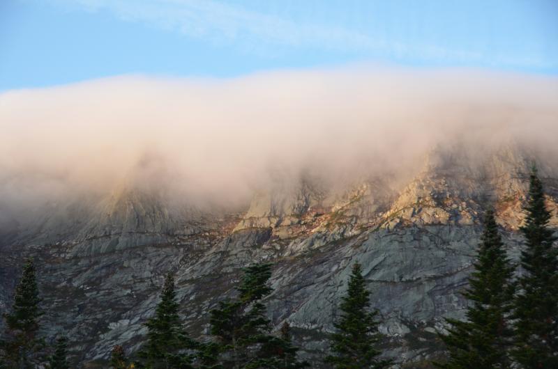 The clouds sweep over Baxter Peak at dawn and dusk, like a moving a quilt. (Photo by Lynda Clancy)