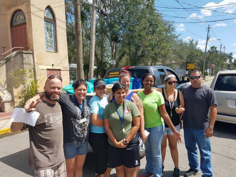 Some of the residents at the St. Francis House, a shelter, in St. Augustine, Florida, greet Nathaniel Bernier (far left), of Lincolnville, and Juan Alcala, of Rockport (far right), after their arrival with a truck full of supplies and tree removal gear to support many in St. John’s County who were affected by Hurricane Irma. (All photos by Nathaniel Bernier and Juan Alcala)