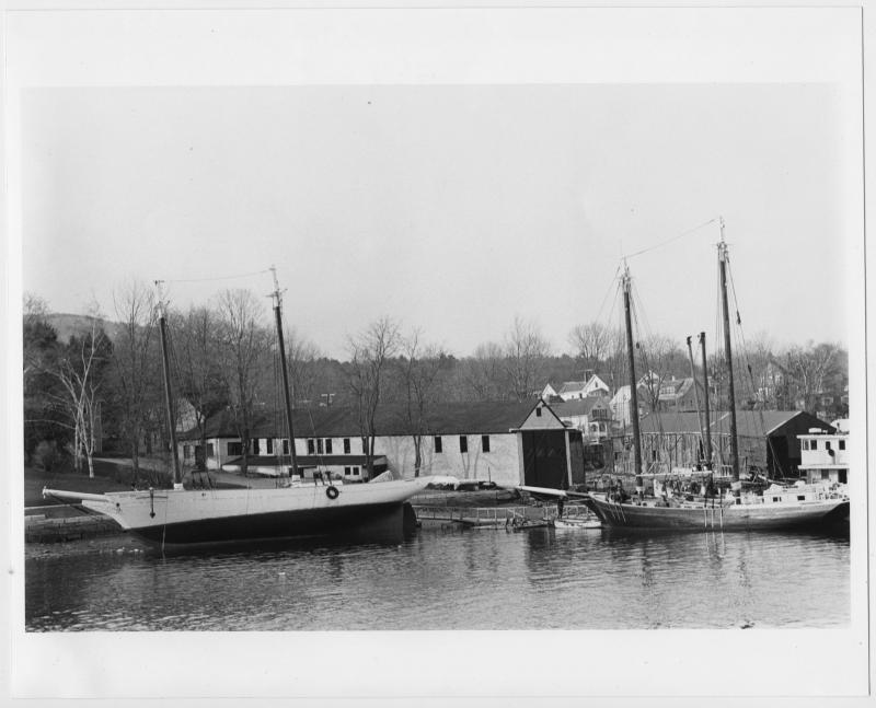 The head of Camden Harbor in 1982, showing the American Boathouse, and the schooner Mary Day on the careening beach.