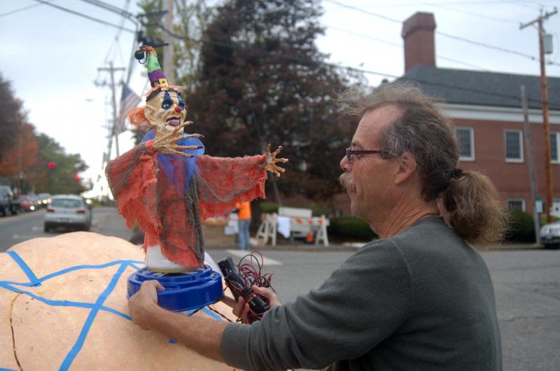 Paul Davis of Blackstone, Massachusetts plans to mount a clown on his “circus tent” pumpkin. ART MAYERS Boothbay Register