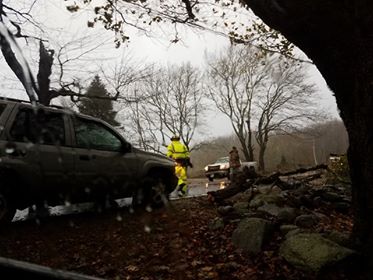 Union Fire Police Jim Murphy, Jr., and a good Samaritan pushing aside a tree on Route 235/Depot Street, Union. Tammy Davis got this photo of crews working Appleton while she was traveling Depot Street through Route 235 to Waldoboro. (Photo courtesy Tammy Davis)