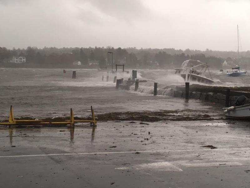 A boat can be seen getting battered by waves during the storm, near Belfast’s downtown boat landing early Oct. 30. (photo courtesy of the Belfast Police Department)