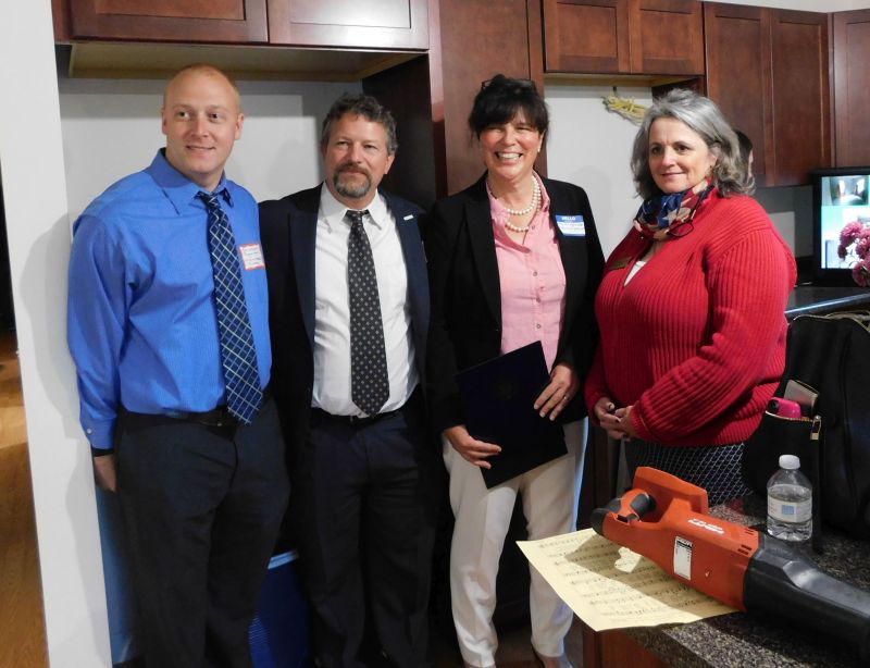 Left to right: Jon Ingraham of MaineStream Finance, Chris Linder of MaineStream Finance, Meg Klingelhofer of HFHWC, and Kelly Cotiaux a representative for Senator Susan Collins. (photo by Erica Thoms)