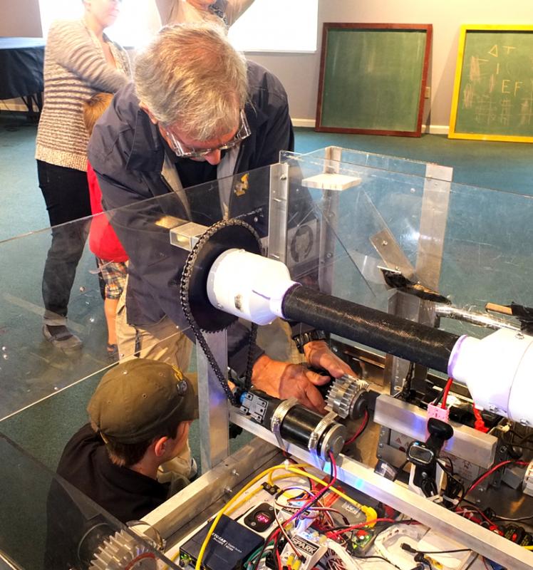 Nick Bradley and Bud Rivers working on robot