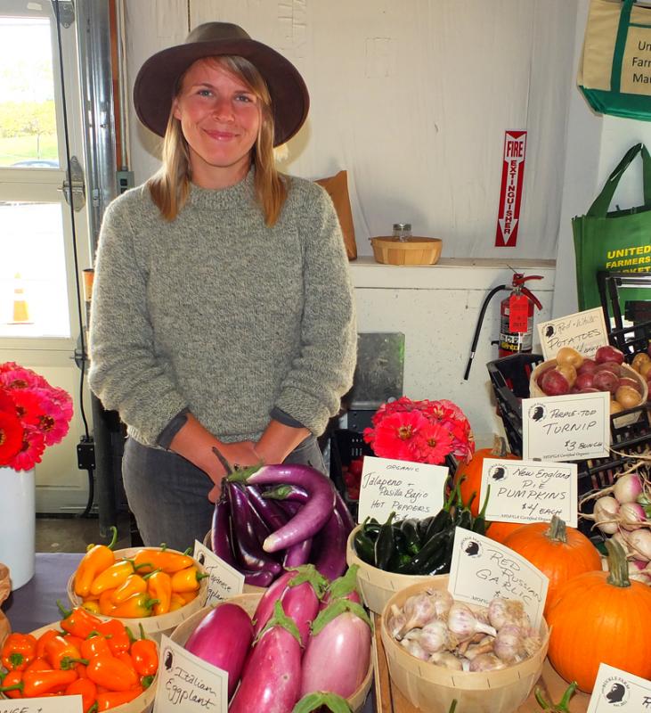 Hannah Hamiltion from the Buckle Farm in Unity. Certified organic vegetables, some fruit and a small herd of pigs. They sell locally and at farmers market and drive produce to Boston and sell to restaurants there.