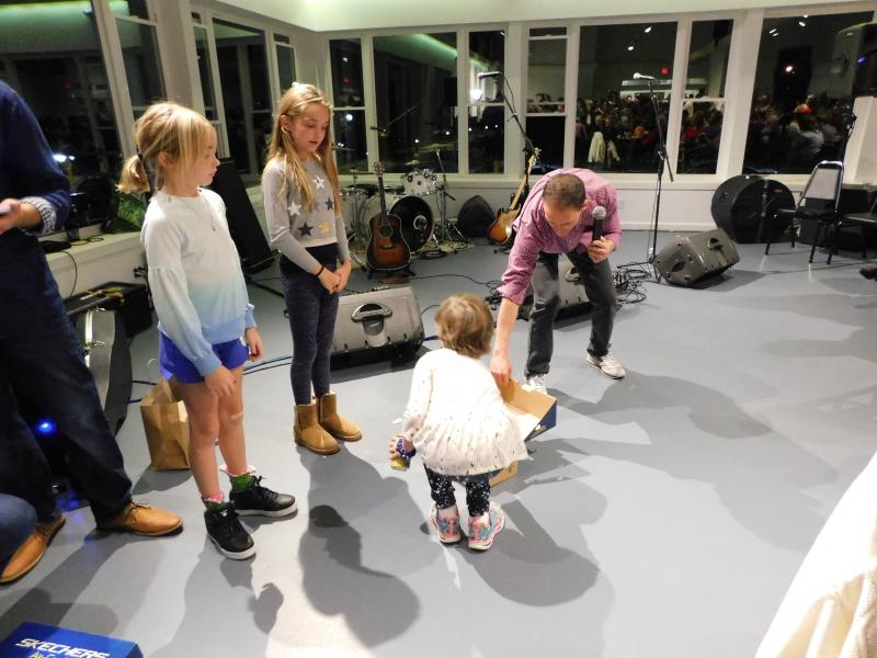 Horne enlisted the help of several nieces to draw winning tickets. (photo by Erica Thoms)