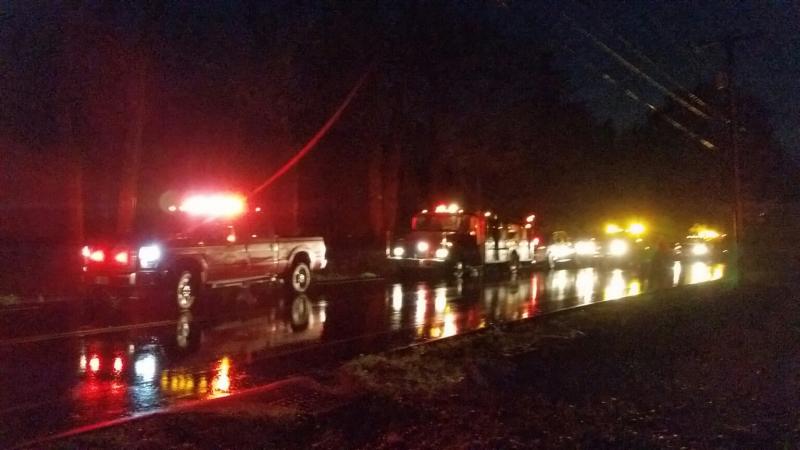 Emergency vehicles from the Rockport Fire Department, Central Maine Power and Camden Exxon. (Photo by Sarah Shepherd)