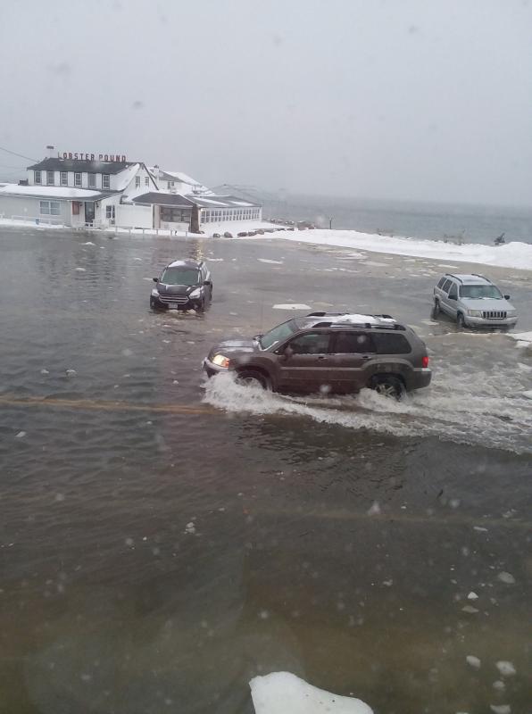 At the height of the storm surge. (Photo courtesy Lincolnville Beach resident Amy Laouamen)