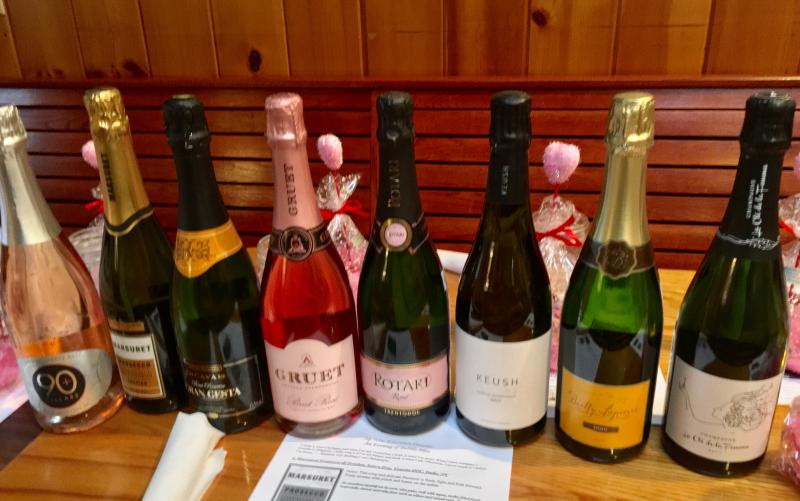 The lineup of Champagnes and other bubblies that Maia Gosselin brought to the Carriage House on Jan. 27. SUZI THAYER/Boothbay Register